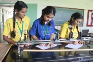 Students conducting a Physics Experiment in the lab at Chaitanya School, showcasing hands-on learning at the Best CBSE School in Gandhinagar.