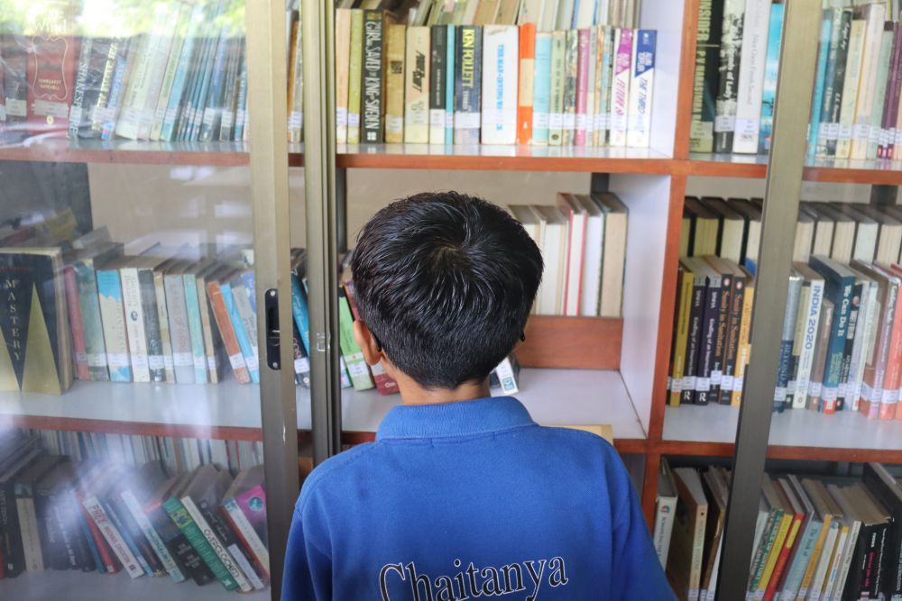 Students reading in the library at Chaitanya School, Best CBSE School Near Me