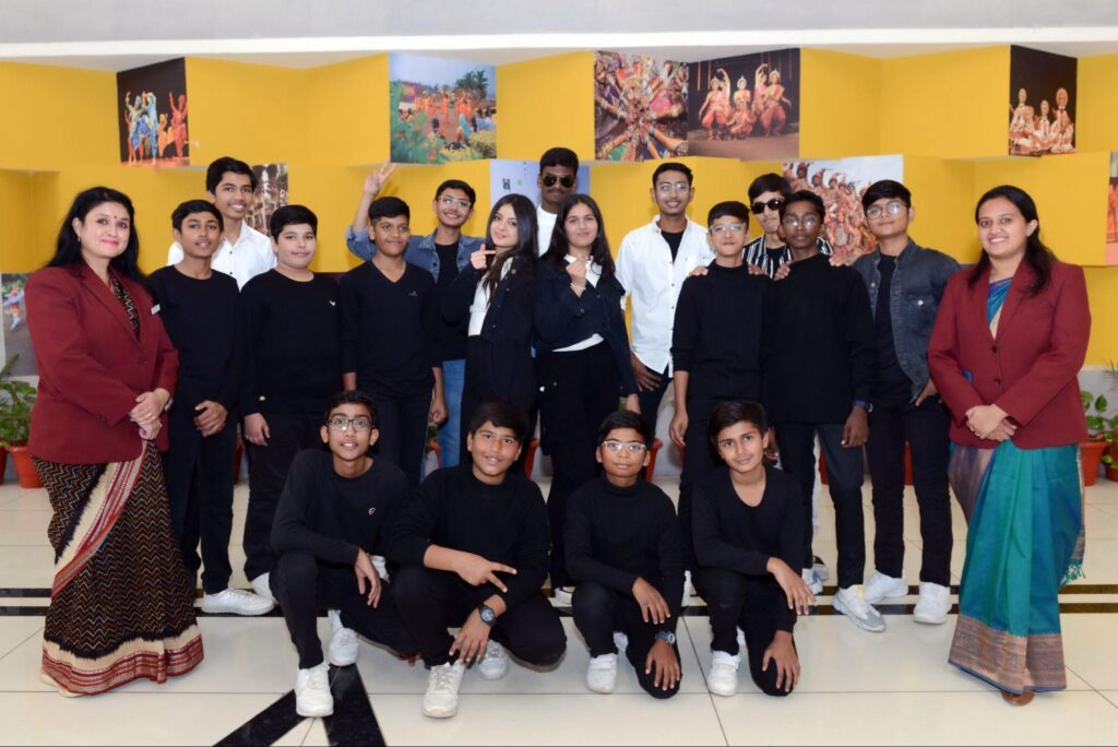Group photo of students and teachers during a school event at Chaitanya School, the Best School in Gandhinagar.