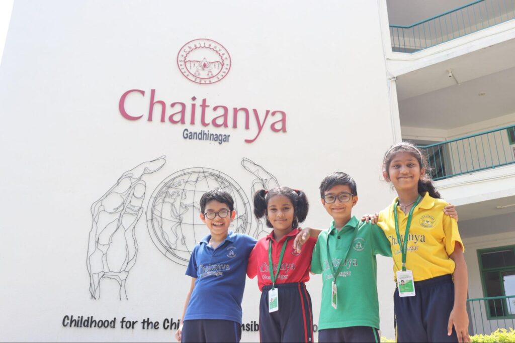 Young learners standing together at Chaitanya School - Best School In Gandhinagar