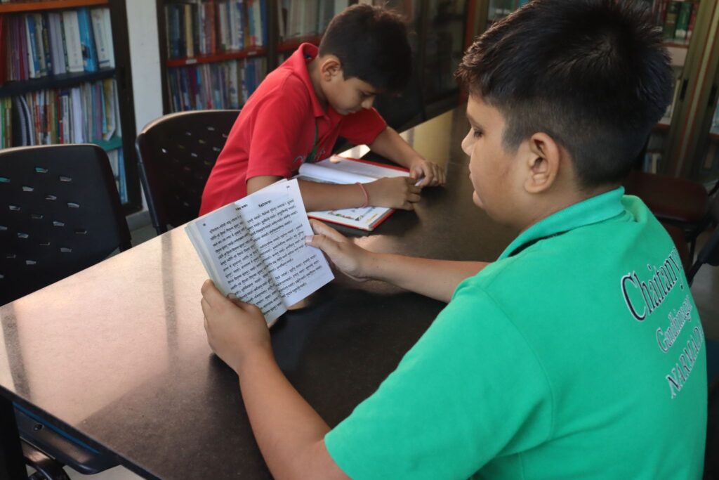Students engaged in learning activities at Chaitanya School 